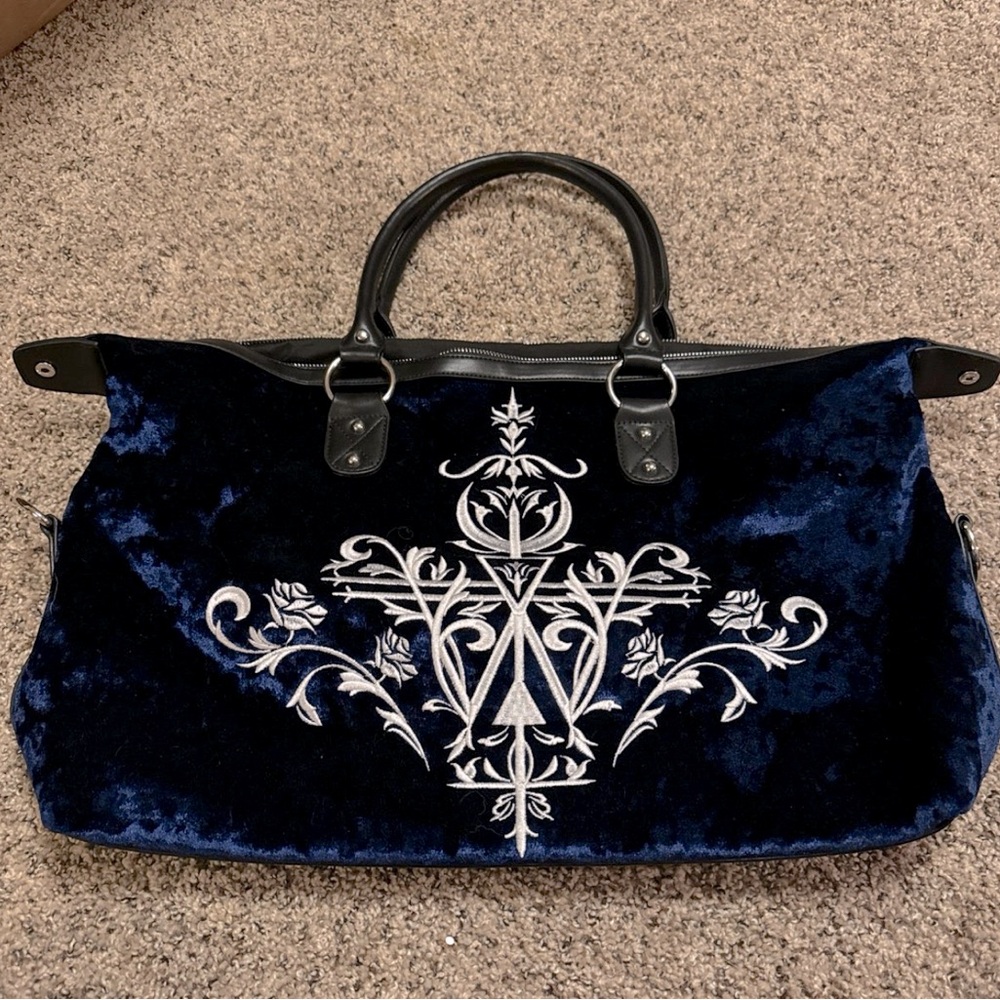 Dolls Kill Dark Blue crushed velvet Widow embroidered bag.